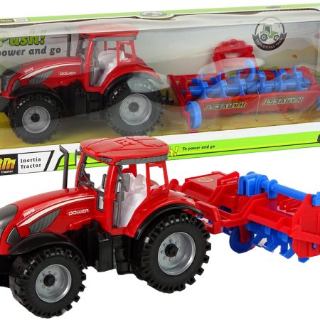 Piros traktor súrlódó meghajtású ekével